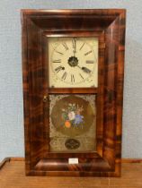A 19th Century American mahogany ogee cased wall clock
