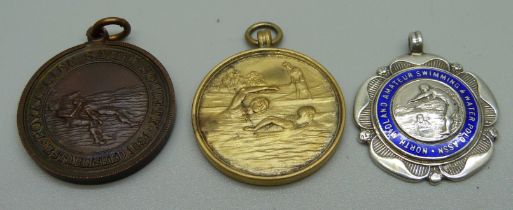 A vintage silver and enamel swimming fob medal and two others including Life Saving