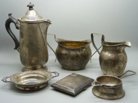 Silver items; hot water pot, cream and sugar, strainer and stand, cigarette case and a butter