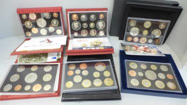 Eight Royal Mint UK coin sets