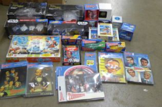 A collection of Captain Scarlet, Star Trek and Thunderbirds toys, etc., mainly boxed