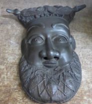 A bronze wall mask of an African chief, height 29cm