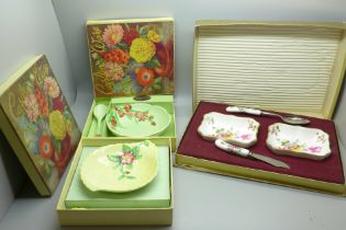 Three boxed dish sets, Royal Crown Derby and two Carlton Ware, all boxed