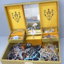 A jewellery box and costume jewellery