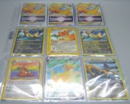 13 Dragonite Pokemon cards including vintage cards and 11 holographic