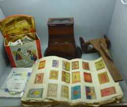 Two stereoscopic viewers, a collection of cards, various places, a collection of Matchbox covers
