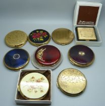 A collection of nine compacts including Stratton