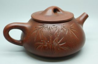 A Chinese terracotta tea pot
