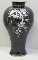 A Chinese enamelled vase with mother of pearl detail, 31cm