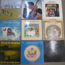 Twelve LP records, mostly singer/songwriter, artists include Joni Mitchell, Bob Dylan, Cat Stevens