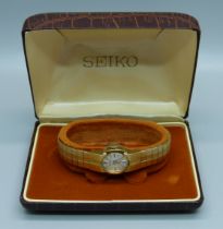 A lady's Seiko gold plated wristwatch, boxed