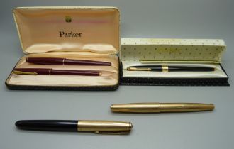 Three Parker pens, one with 14ct gold nib and a Parker pen set, personalised