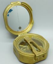 A brass Natural Sine compass