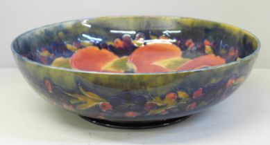 A large early Moorcroft pomegranate bowl, a/f, diameter 33cm