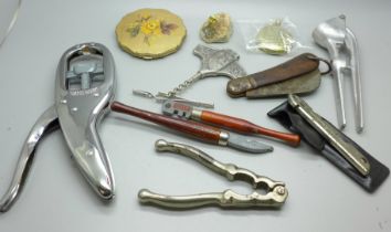 A corkscrew, a pocket watch, a pen knife and a collection of tools