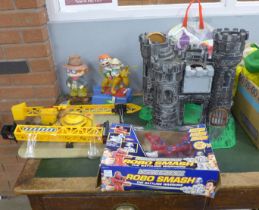 Toys; military models, Rug Rat toy, model vehicles, Robo Smash game, roller blades, a castle and
