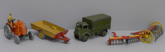 A Dinky Toys Field Marshall tractor, Army Wagon, Halesowen Farm Trailer, a Disc Harrow and one other