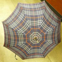 A vintage Burberry umbrella