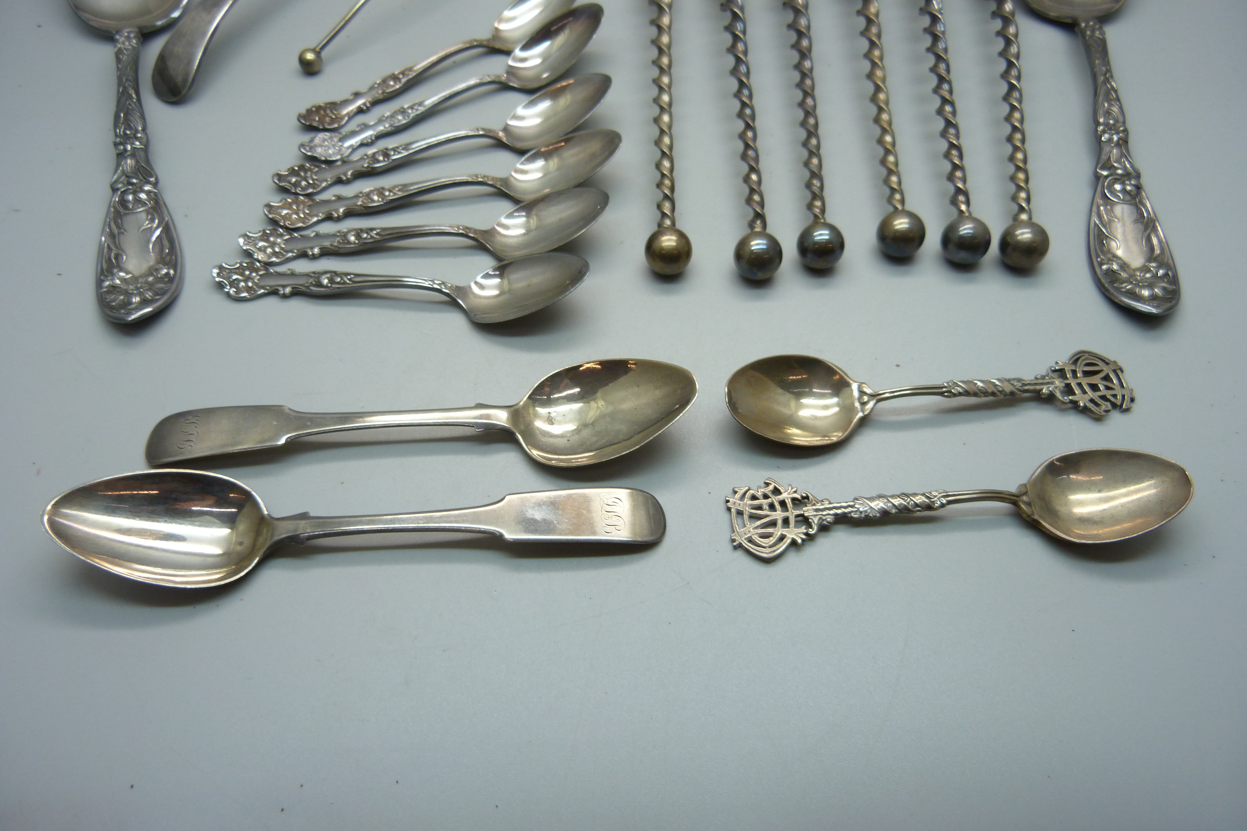 Four silver spoons, 64g, and a collection of plated flatware - Image 2 of 4