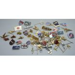 A collection of mainly aircraft and airline related pins and badges including TWA, BEA, Japan and