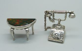 A hallmarked novelty miniature silver telephone and a similar side table set with bloodstone,