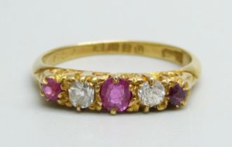 A vintage 18ct gold, ruby and diamond ring, London 1915, 2.4g, K, (one ruby possibly replaced)