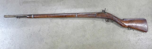 An Indian flinklock rifle