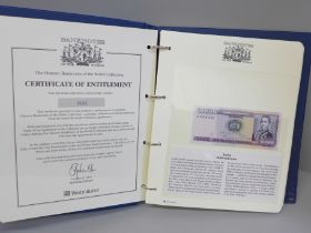 A Westminseter Banknotes of the World folder of banknotes