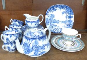 A boxed Royal Pembroke & Edwards tea cup, saucer and cake plate and an English blue and white tea