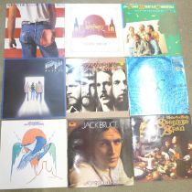A collection of LP records including Bruce Springsteen, The Eagles, etc.