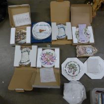 A collection of Bradford Exchange plates, hangers and a porcelain mantel clock **PLEASE NOTE THIS