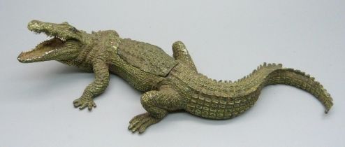 After Franz Bergman, a cold painted bronze model crocodile with lid and miniature bronze nude,