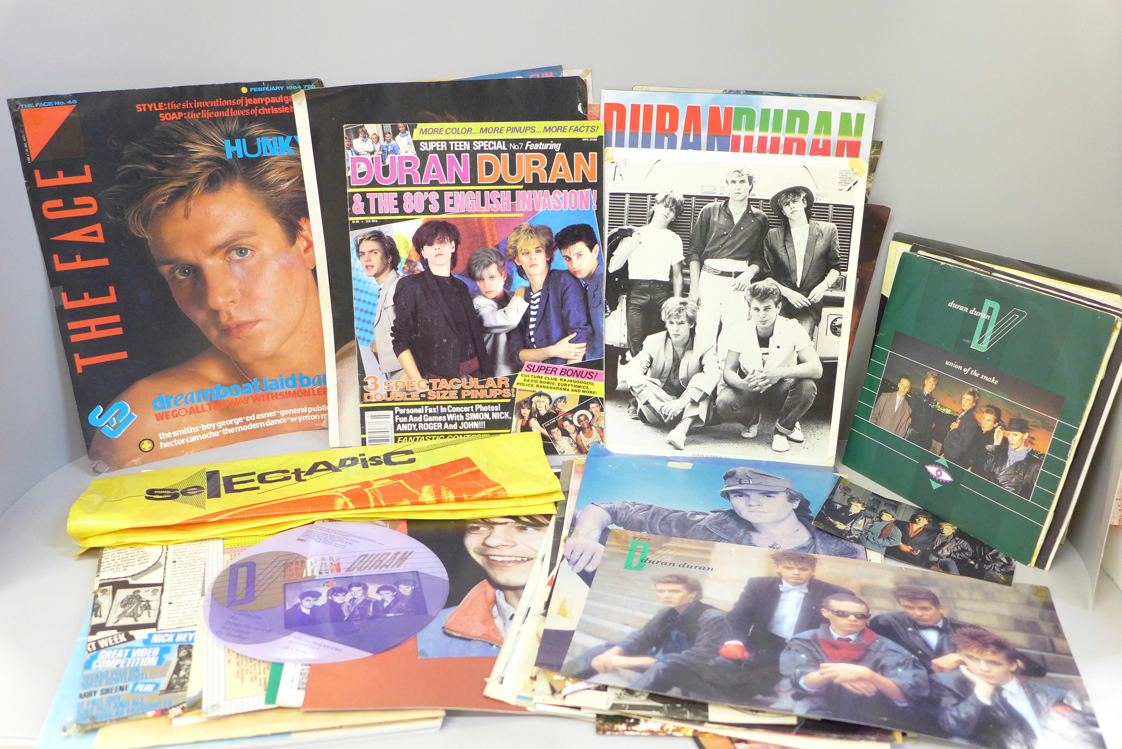 Duran Duran memorabilia including singles, posters, a book and fan club newsletters