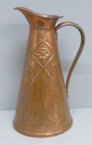 A copper Art Nouveau pitcher, JS&S backstamp, 27cm