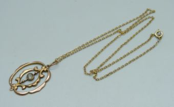 A vintage 9ct gold pendant and chain, 1.9g