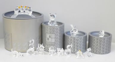 A collection of eight Swarovski animals and four boxed, including four birds on a branch