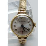 A lady's 9ct gold cased wristwatch, H.L. Brown