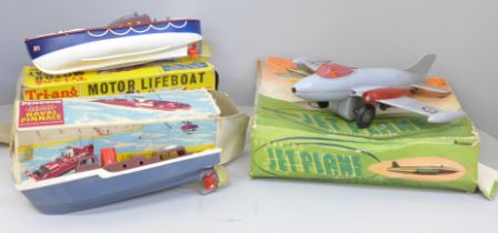 Three models, Tri-ang Motor Lifeboat, Penguin clockwork Naval Pinnace and a Sparking Jet Plane