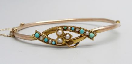 A 9ct gold, turquoise and pearl bangle, 4.7g