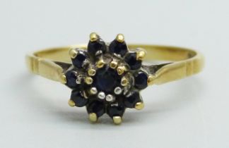 A silver gilt, sapphire cluster ring, P