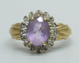 A 9ct gold, amethyst and diamond ring, 2.9g, Q