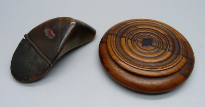 A circular turned wood snuff box, 7cm, and a shaped horn snuff box