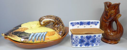 A large Spanish dish with lid in the form of a duck, a Dartmouth gluggle jug and a salt dish by