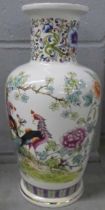 An oriental vase with bird design