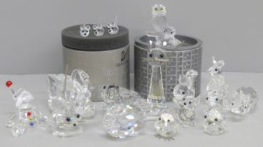 A collection of twelve Swarovski animals including two boxed
