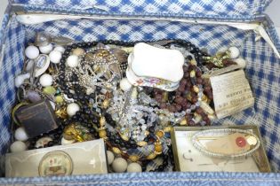 A small suitcase of costume jewellery