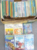 A collection of children's books from 1960s and 1970s including Ladybird and Enid Blyton
