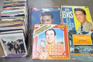 A collection of LP records and 45rpm records