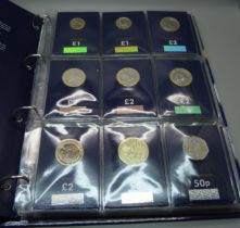 A Change Checker coins folder, 5x £2 coins, 42x 50p coins, 2x £1 coins and 1x £5 coin