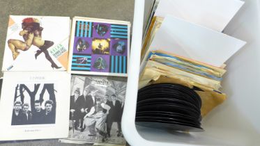A collection of 45rpm singles, 1960s and 80s including 15 Elvis records, also including Beatles,
